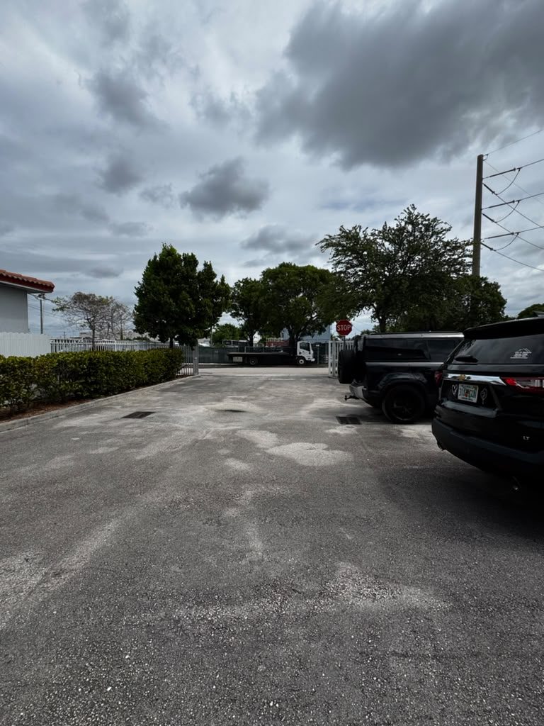Secure gated yard with private parking